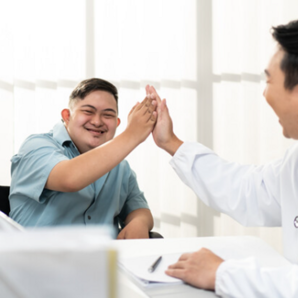 patient with disabilities and doctor