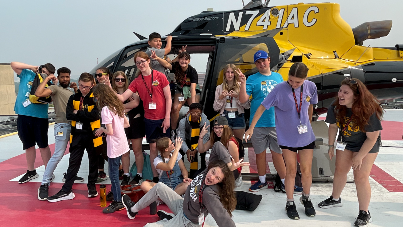 INSTI camp kids at UIHC helipad